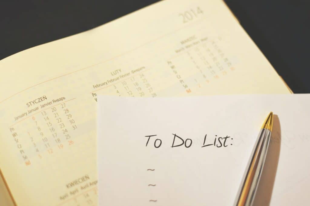 pen and calendar to do checklist Guide to Setting Your Career Goals