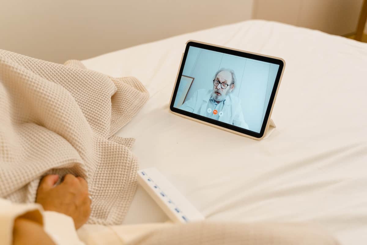 A mental health expert giving professional help to a patient via video call