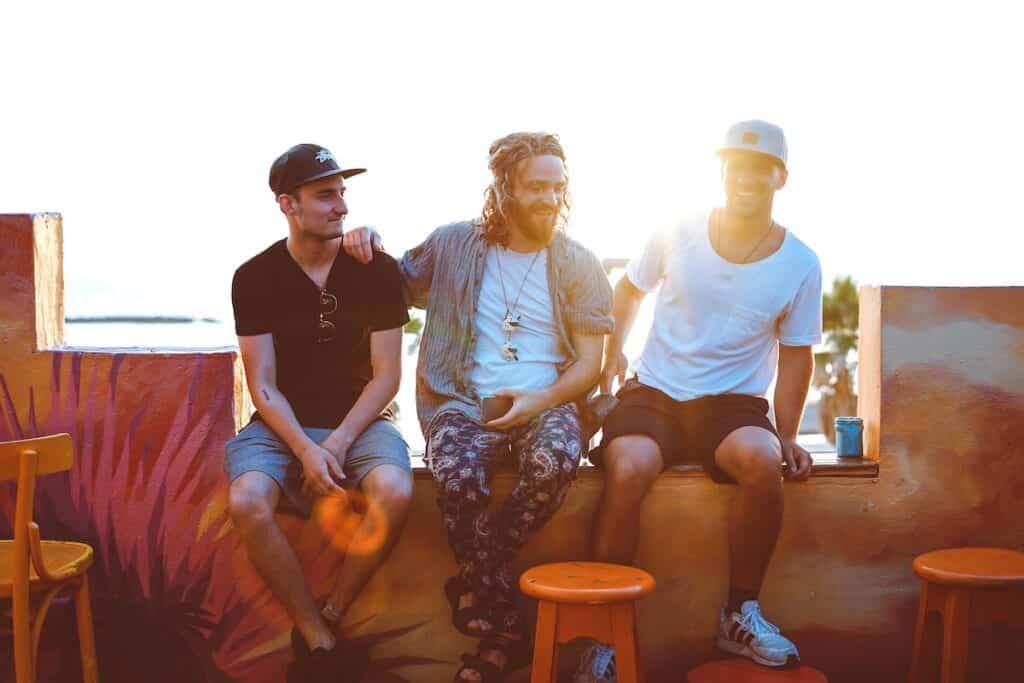 Three men enjoying each other’s company